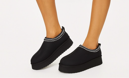 Open shoes with a high platform and zigzag stitching