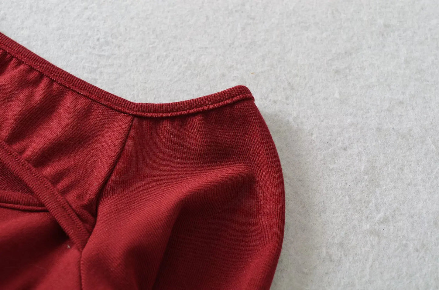 A long shirt with an opening at the neckline and a built-in bra