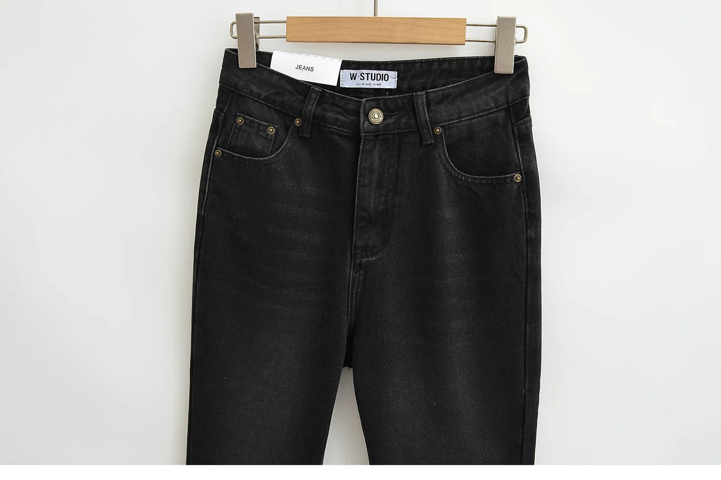 Flared jeans with rips at the knees