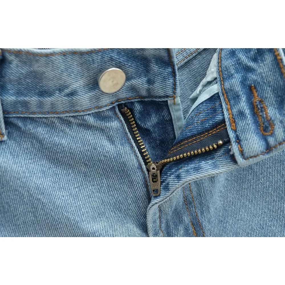Jeans with a tear in the knee