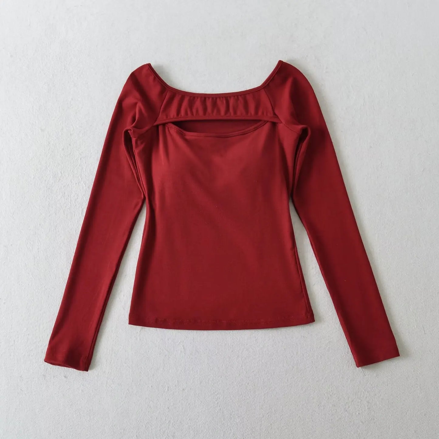 A long shirt with an opening at the neckline and a built-in bra