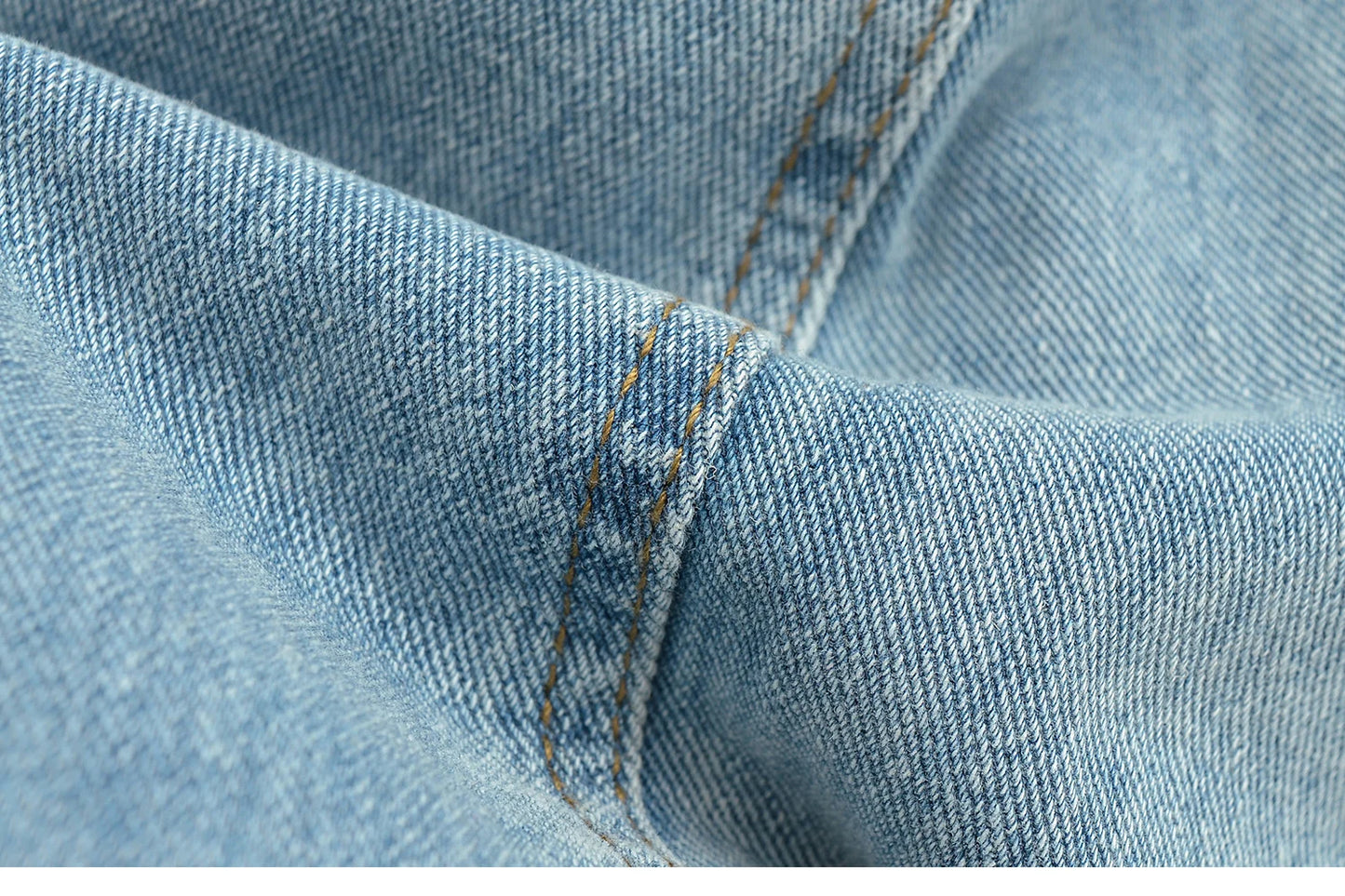 Flared jeans with rips at the knees