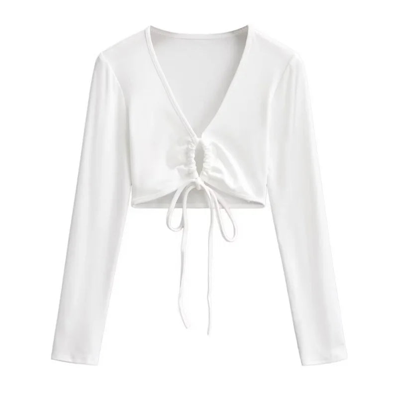 A long shirt with a circle tie in the stomach