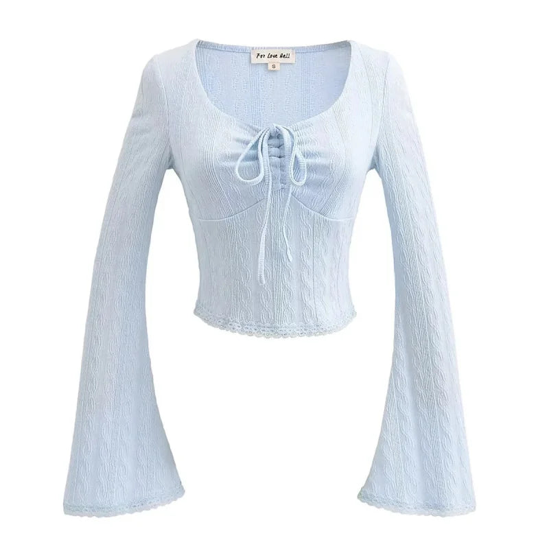 Aesthetic shirt with a tie in the chest and lace decorations