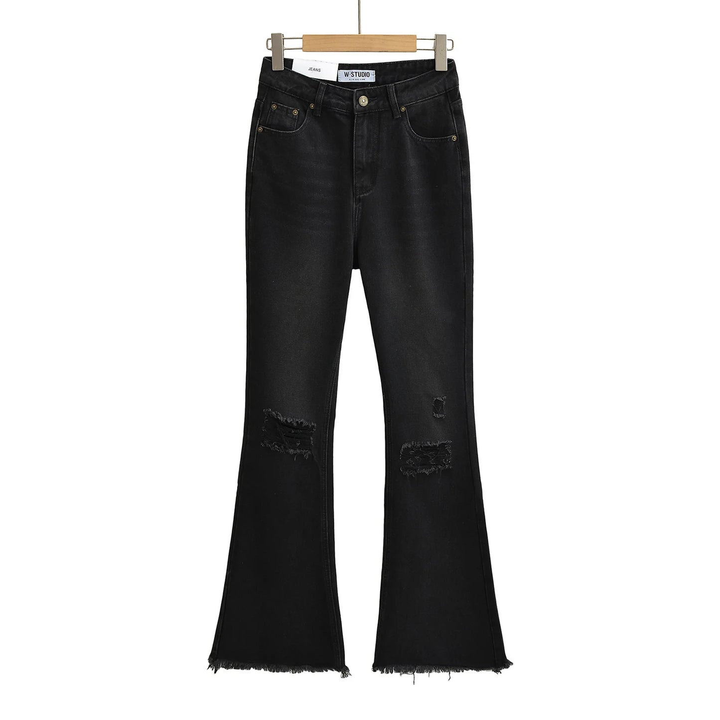 Flared jeans with rips at the knees
