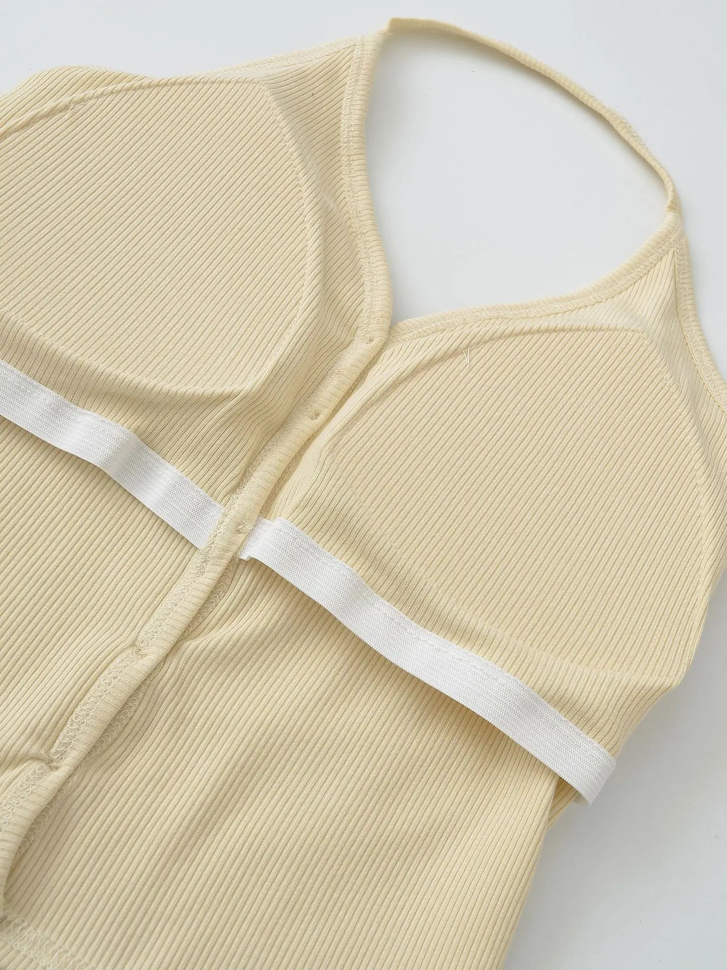 Buttoned collar tank top with a built-in bra