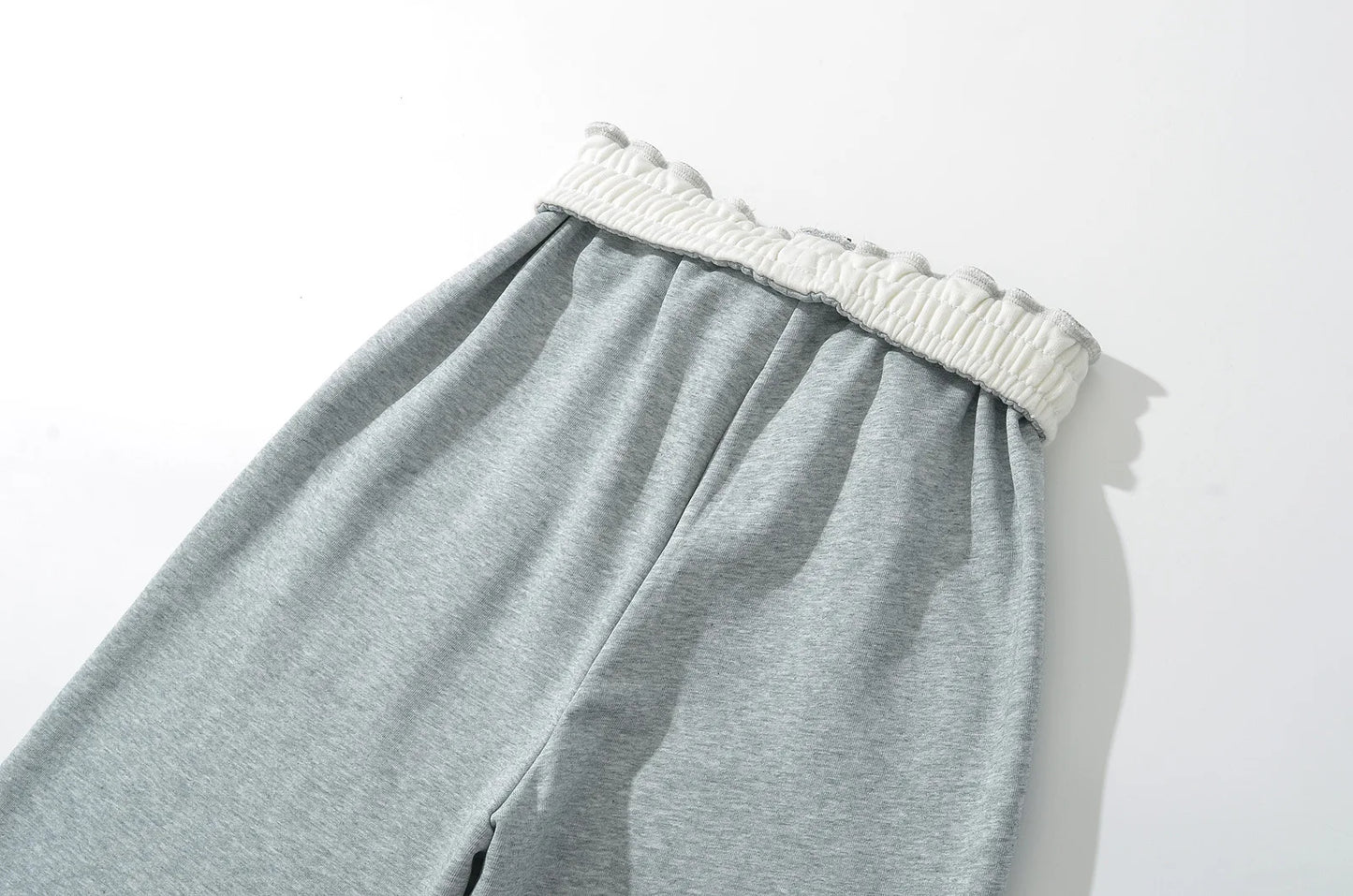 Sweatpants with folded rubber
