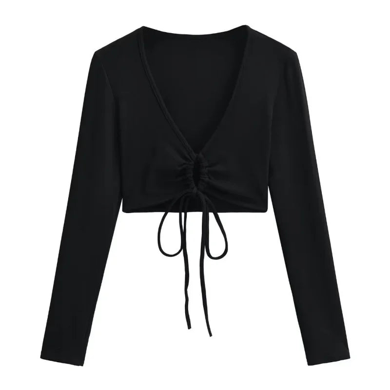 A long shirt with a circle tie in the stomach