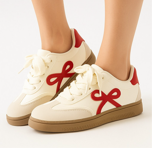 Sneakers with a red bow