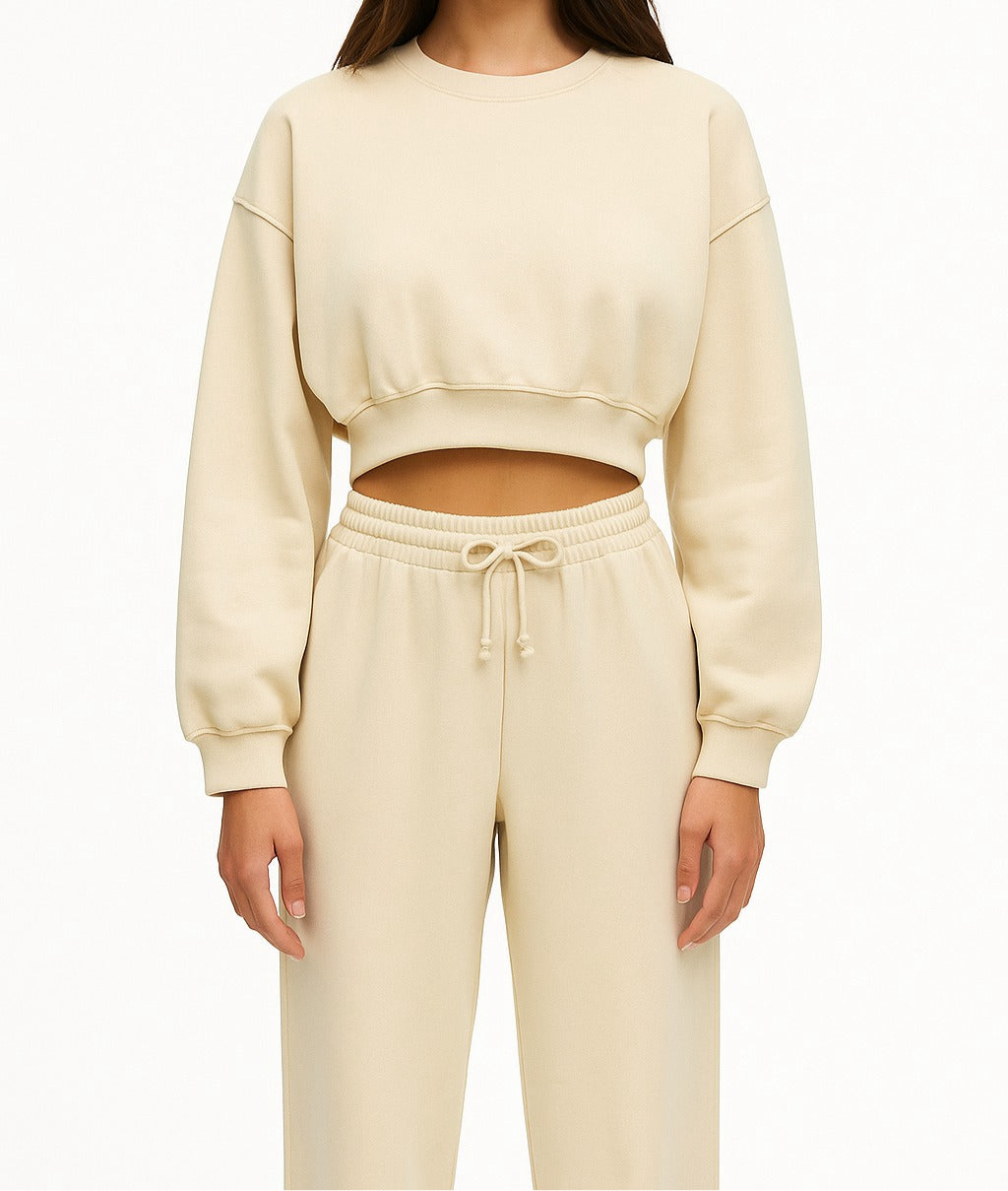 A set of sweatpants and a sweatshirt with a belly cut