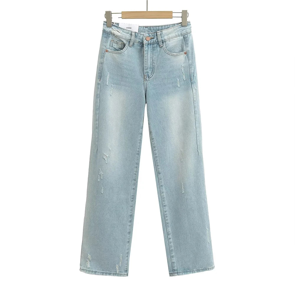 Straight jeans with a few tears