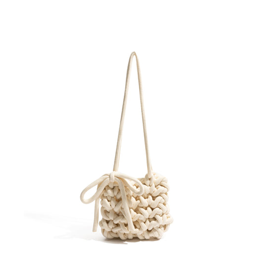 Soft knitted bag with bow tie