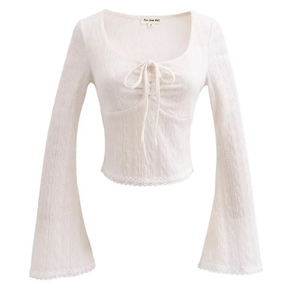 Aesthetic shirt with a tie in the chest and lace decorations