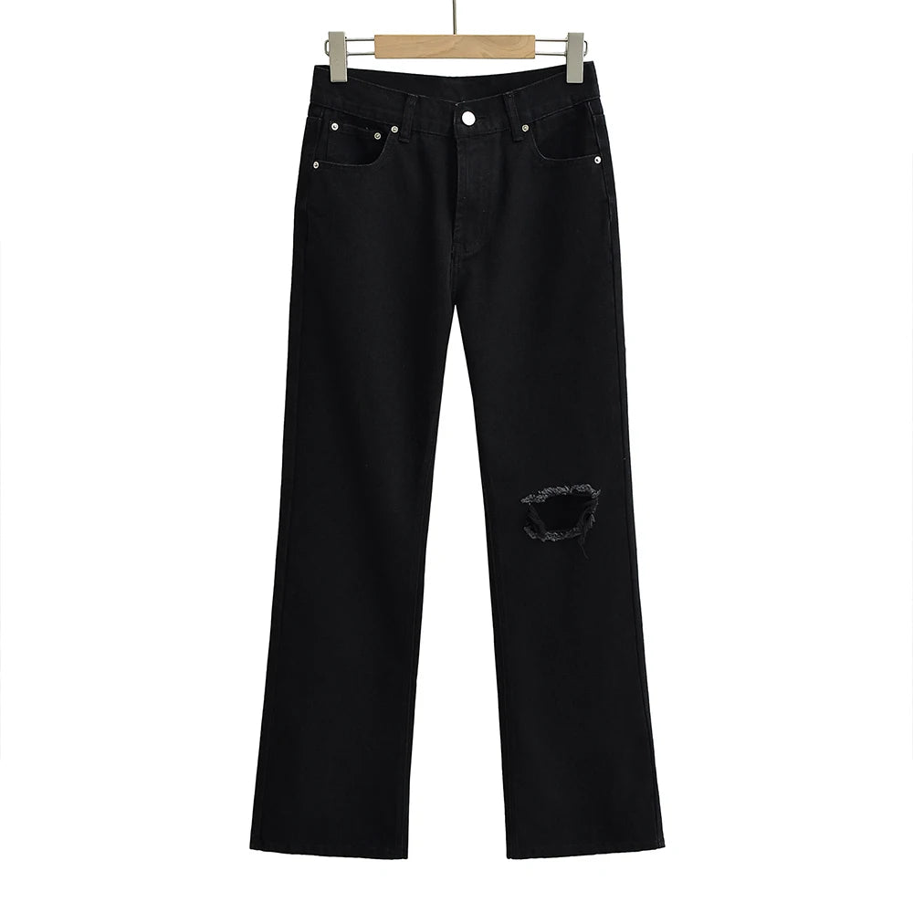 Jeans with a tear in the knee