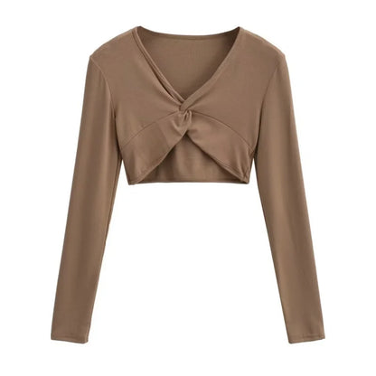 A long camisole is turned at the neckline