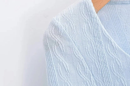 Aesthetic shirt with a tie in the chest and lace decorations