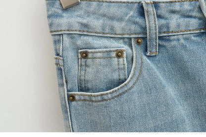Flared jeans with rips at the knees