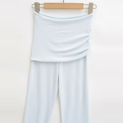 Tights with folds at the waist