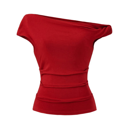 A shirt with a falling shoulder and shirring at the waist
