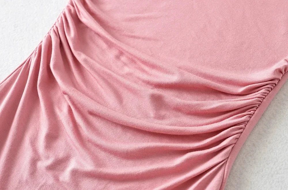 Collared dress with pleats at the waist