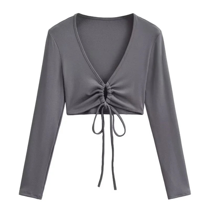 A long shirt with a circle tie in the stomach