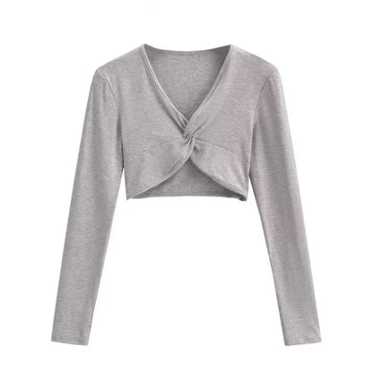 A long camisole is turned at the neckline