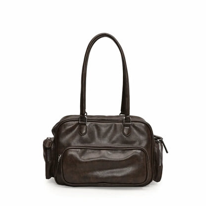 A small handbag with several pockets