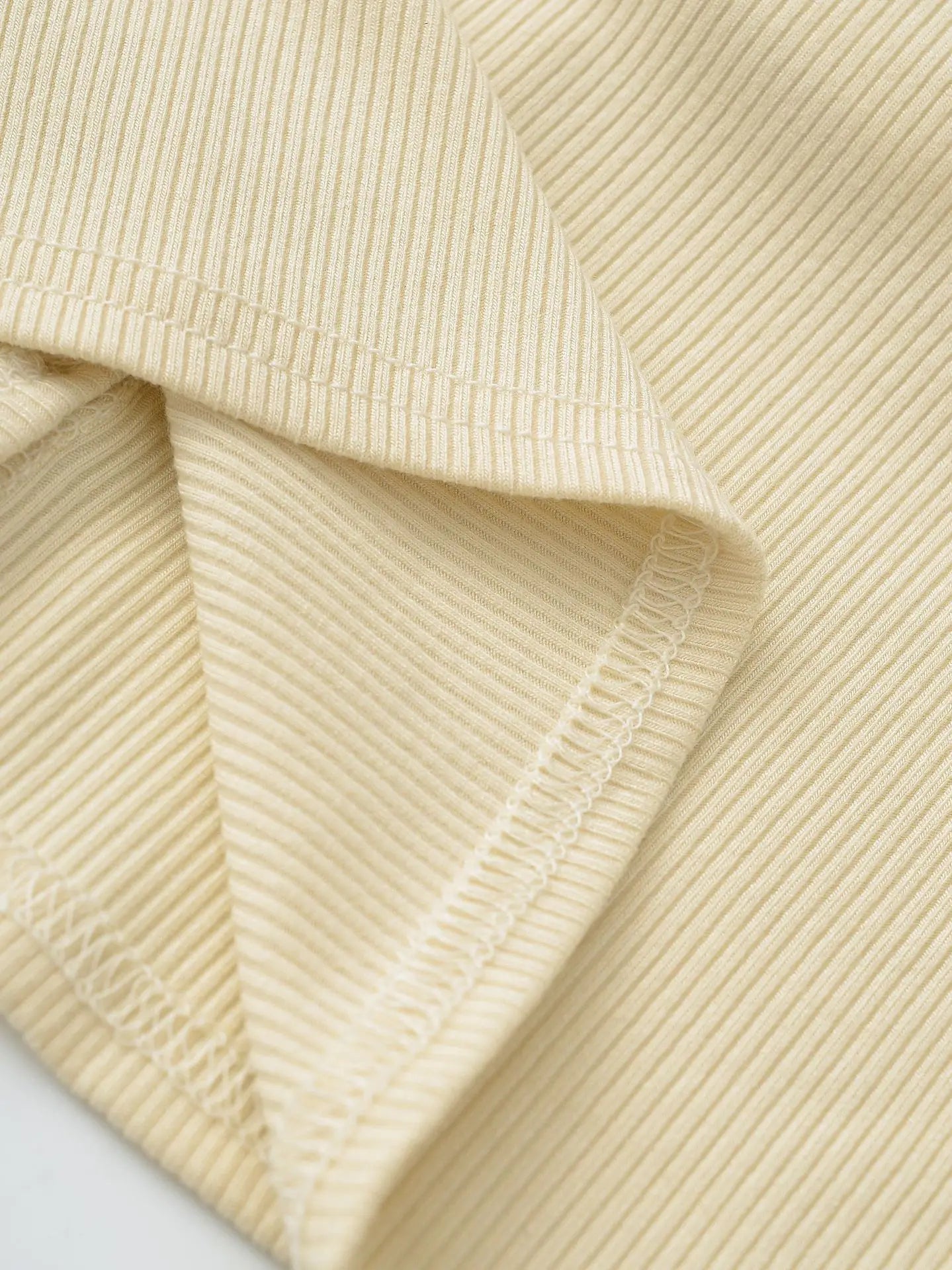 Buttoned collar tank top with a built-in bra