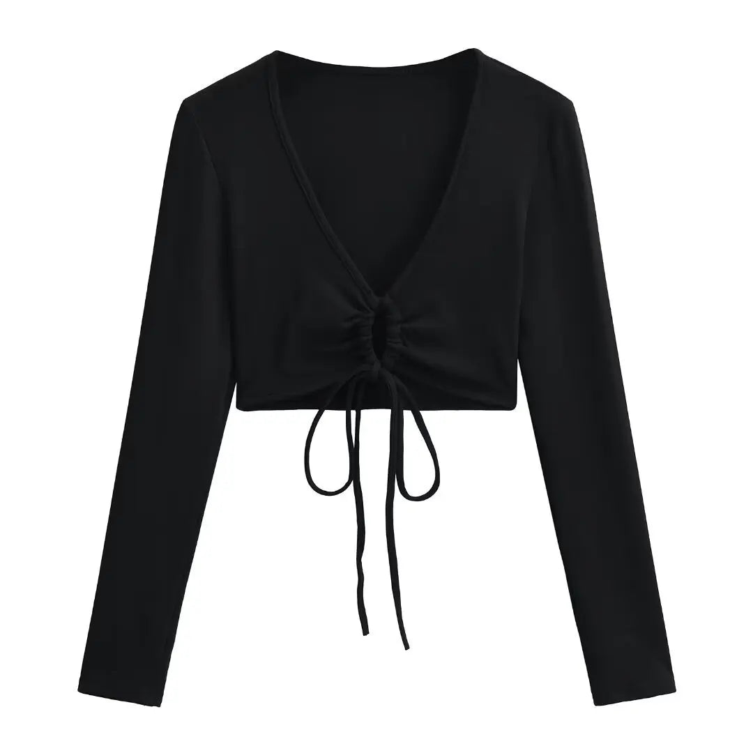 A long shirt with a circle tie in the stomach