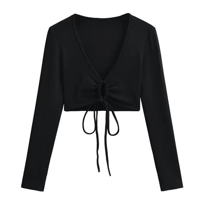 A long shirt with a circle tie in the stomach