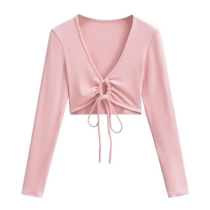 A long shirt with a circle tie in the stomach