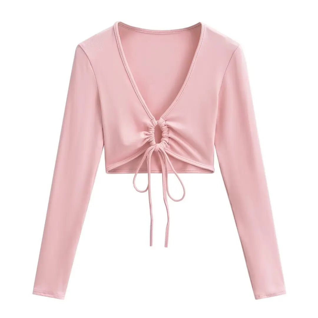 A long shirt with a circle tie in the stomach