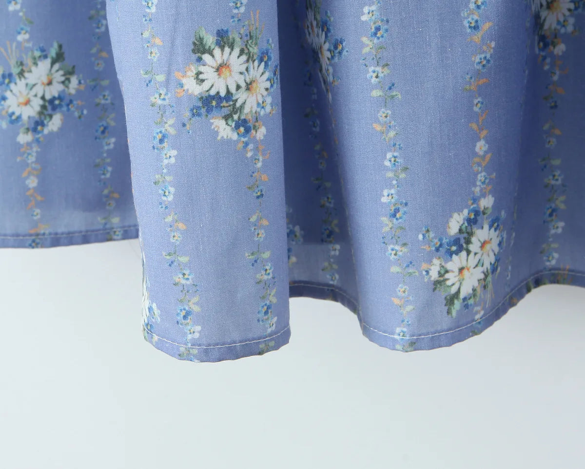 Blue dress with white flowers