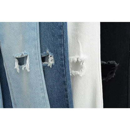Jeans with a tear in the knee