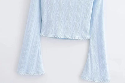 Aesthetic shirt with a tie in the chest and lace decorations