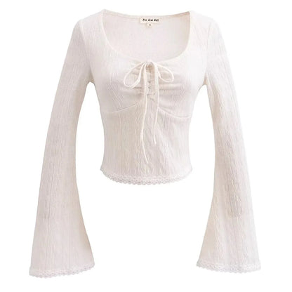 Aesthetic shirt with a tie in the chest and lace decorations
