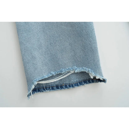 Jeans with a tear in the knee