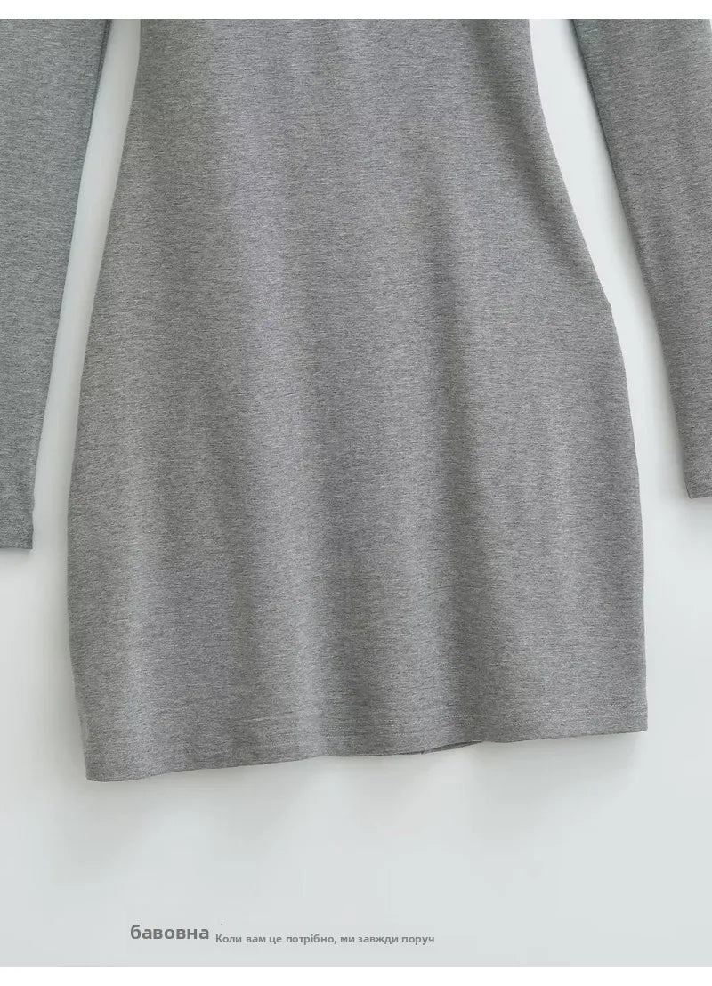 A dress with a built-in bra and an open back
