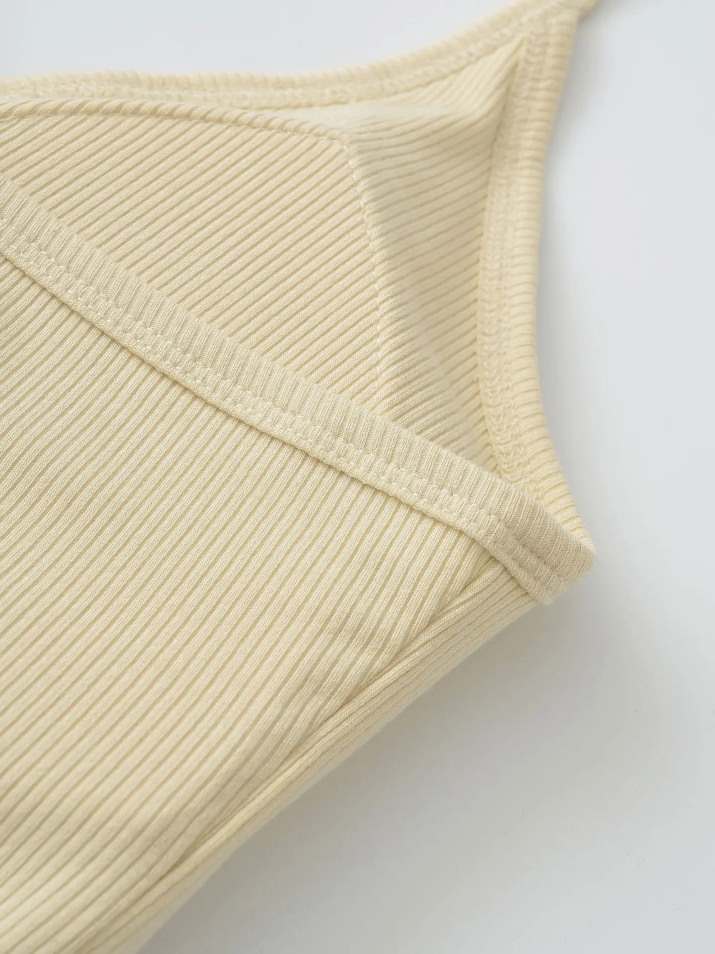 Buttoned collar tank top with a built-in bra