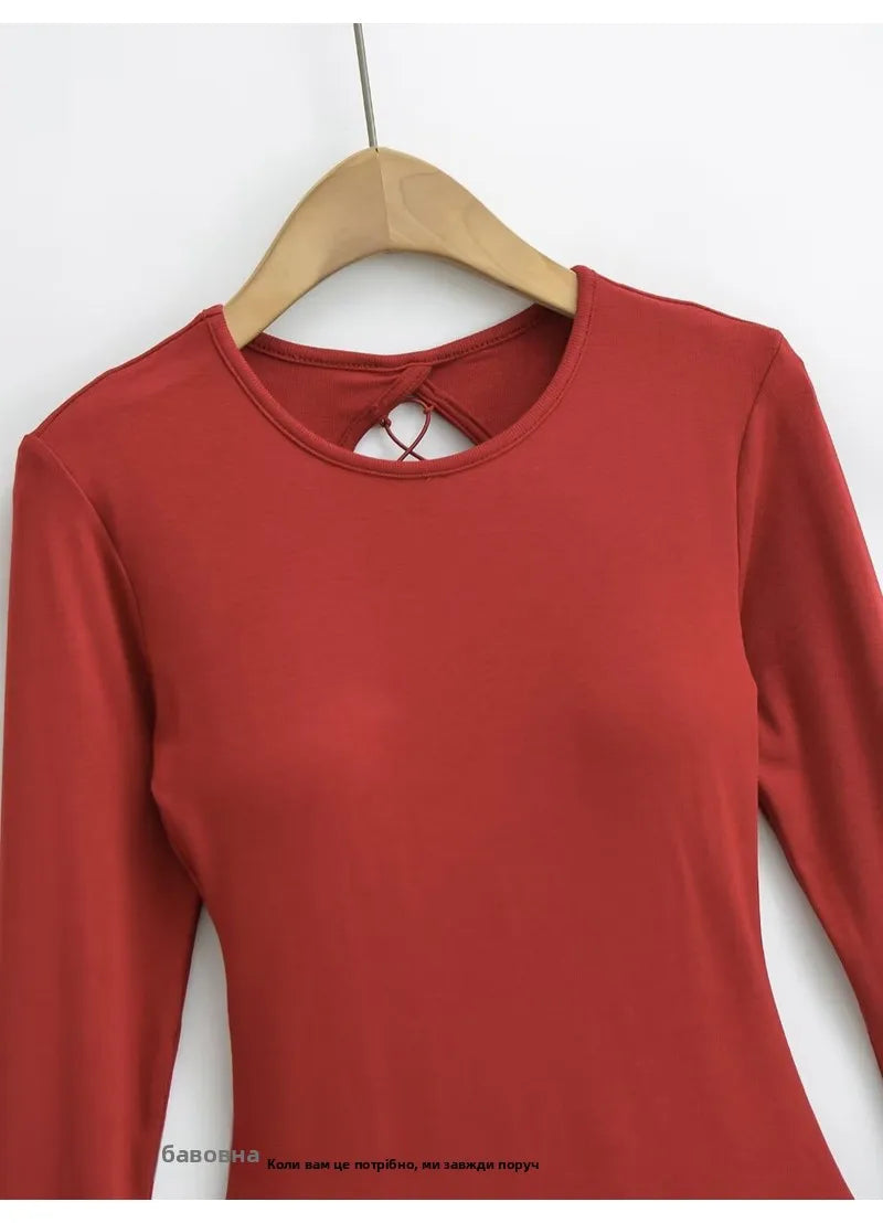 A dress with a built-in bra and an open back