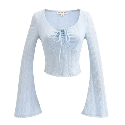 Aesthetic shirt with a tie in the chest and lace decorations