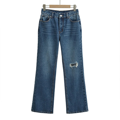 Jeans with a tear in the knee