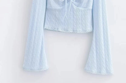 Aesthetic shirt with a tie in the chest and lace decorations