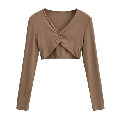 A long camisole is turned at the neckline