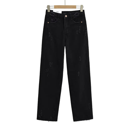 Straight jeans with a few tears