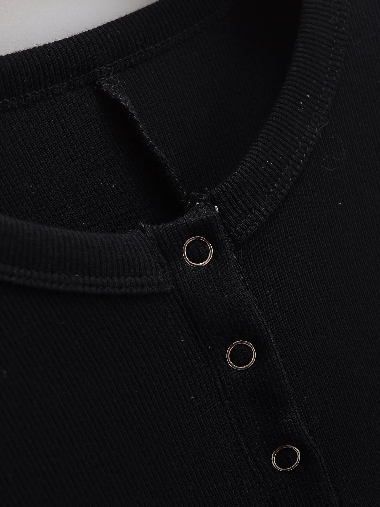 Tight overall with Tic Tac buttons