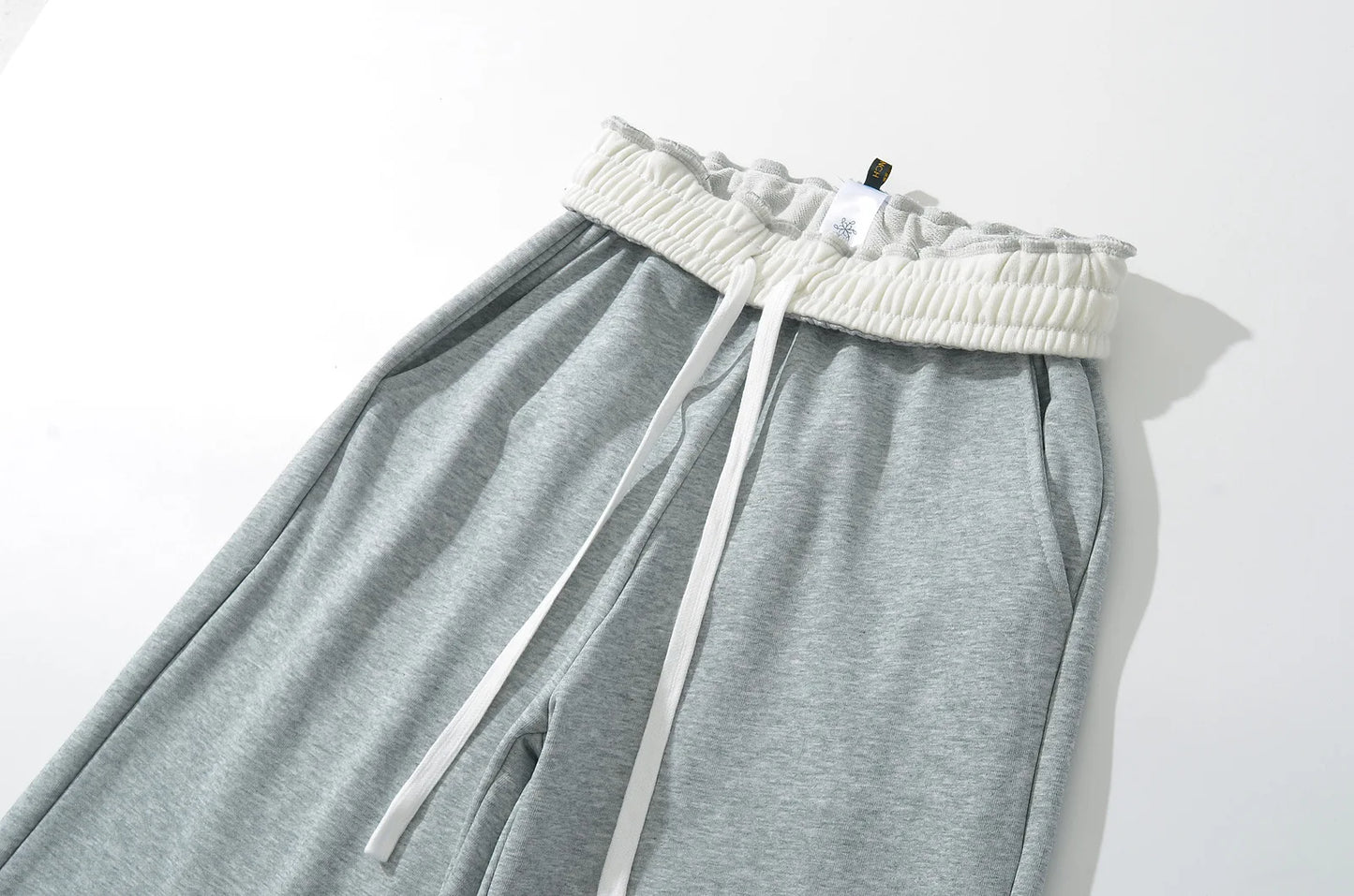 Sweatpants with folded rubber