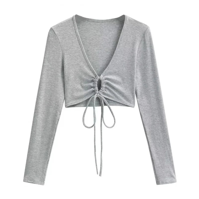A long shirt with a circle tie in the stomach