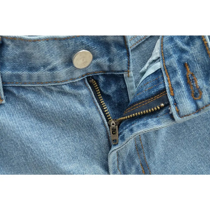 Jeans with a tear in the knee