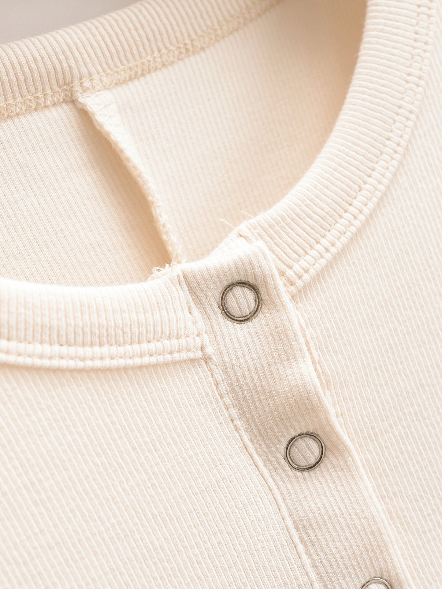 Tight overall with Tic Tac buttons